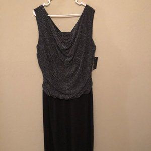 Formal Black dress with Silver Metalica thread top shell.  Size 18